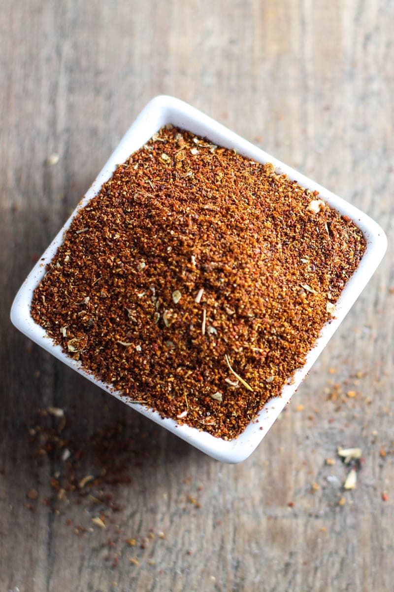 Small square bowl filled with homemade taco seasoning