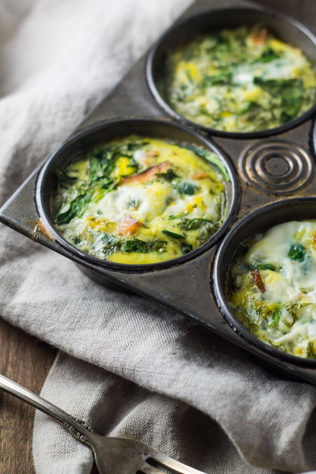 Close up side shot of low FODMAP Smoked Salmon and Spinach Frittata Cups