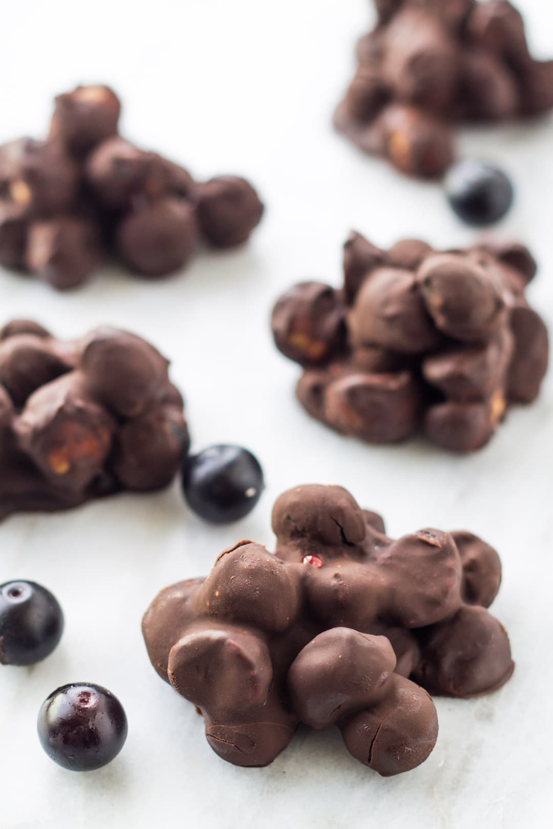 Frozen clusters of dark chocolate, blueberries, and macadamia nuts