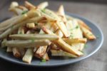 Crisp and delicious, these baked Low Fodmap Garlic Fries use garlic-infused olive oil for a subtle garlic flavor.