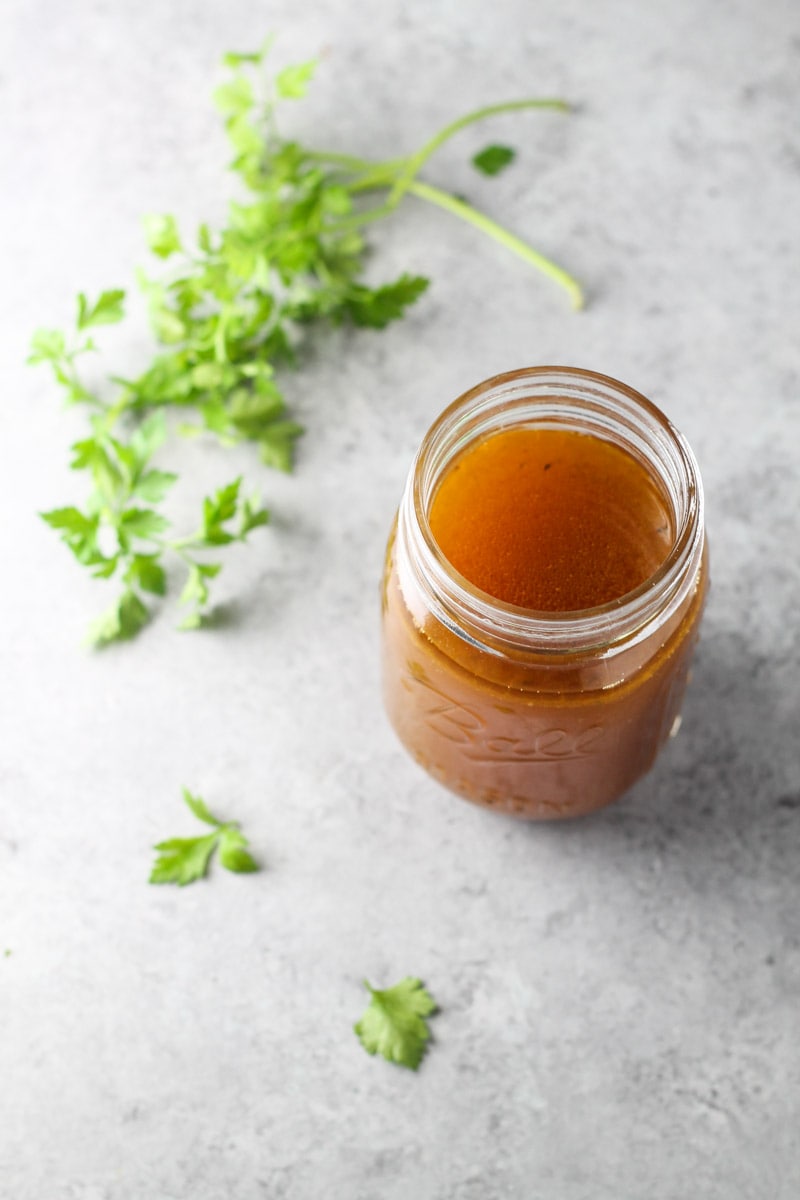 Mason jar filled with chicken broth