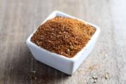 Small white square bowl filled with low FODMAP taco seasoning