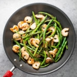Shrimp and green bean stir fry in skillet
