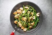Shrimp and green bean stir fry in skillet