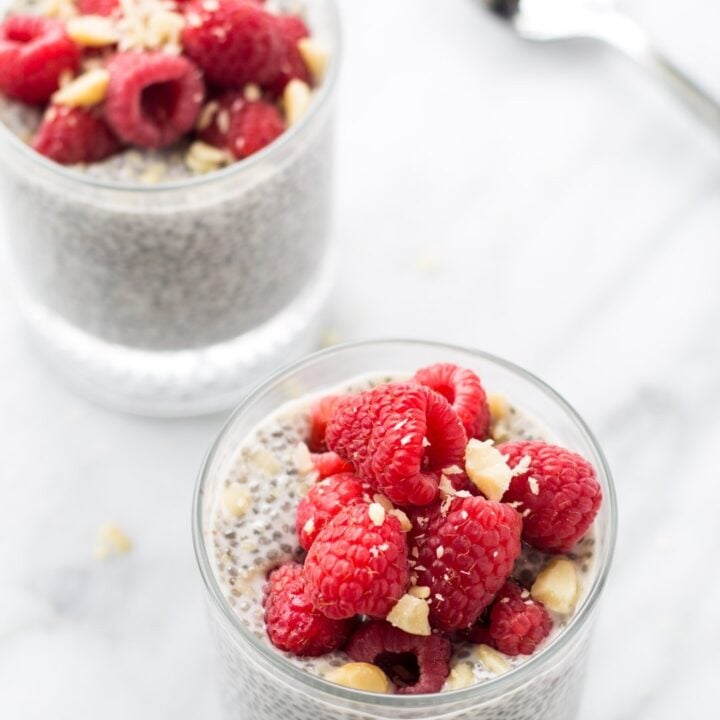 Two cups filled with low FODMAP raspberry vanilla chia pudding