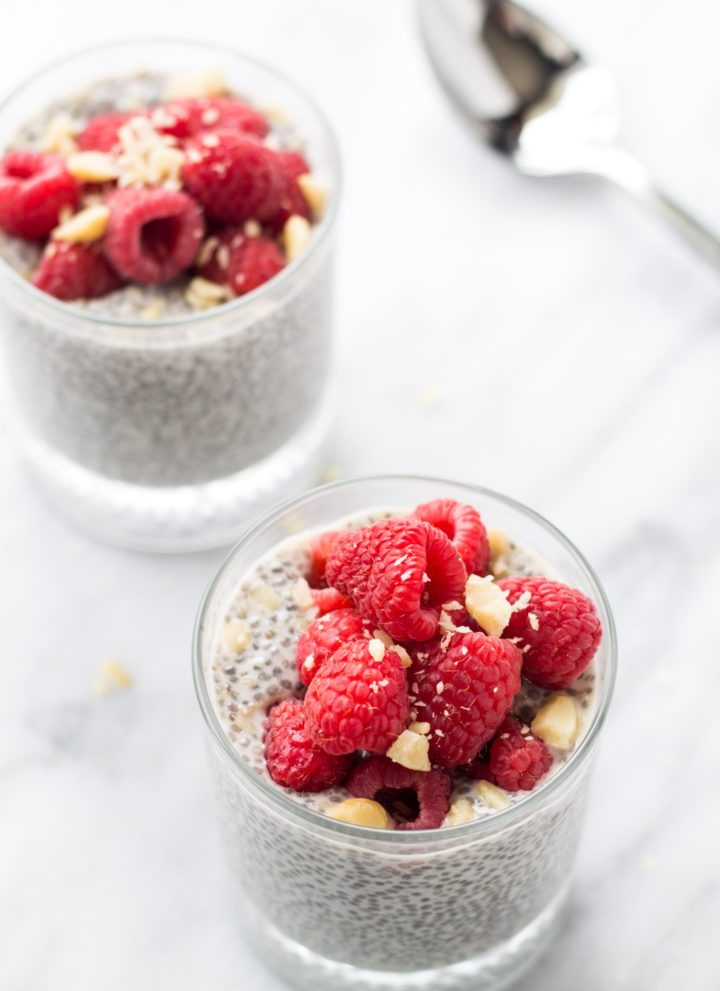 Two cups filled with low FODMAP raspberry vanilla chia pudding