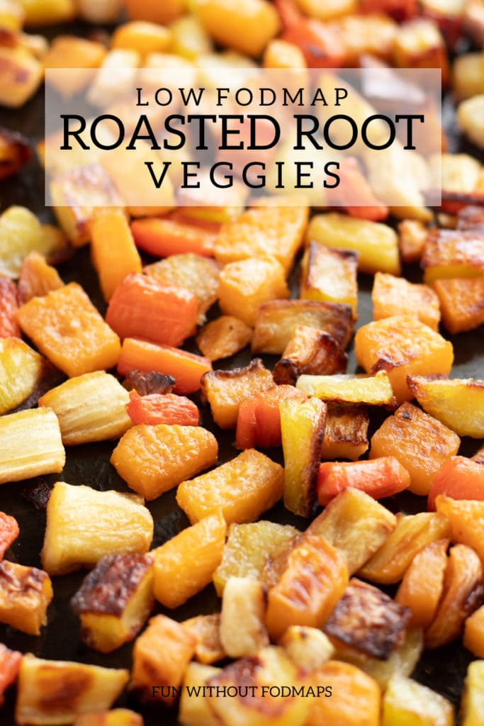 A pan of low FODMAP roasted root veggies with a text overlay reading low FODMAP roasted root veggies