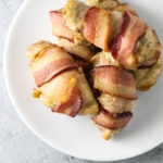 Overhead shot of a plate of low FODMAP bacon wrapped chicken