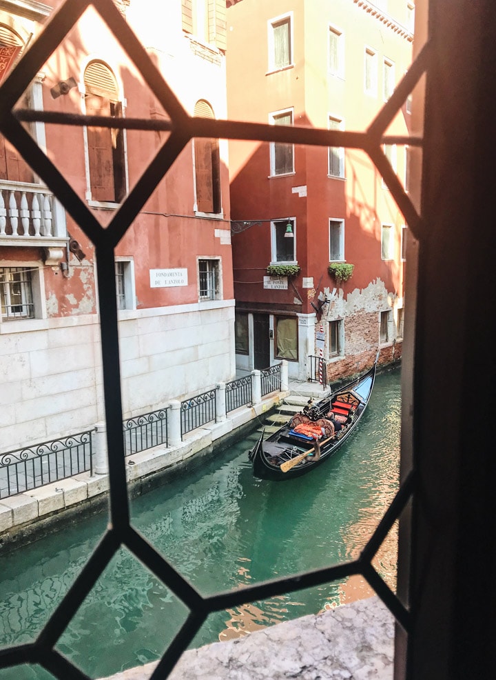 View of a gondola in the canal in Venice Italy