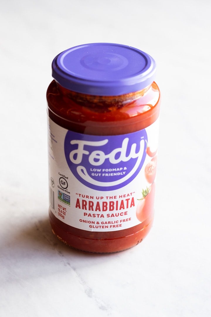 A jar of Fody Foods low FODMAP arrabbiata sauce for low FODMAP shakshuka.