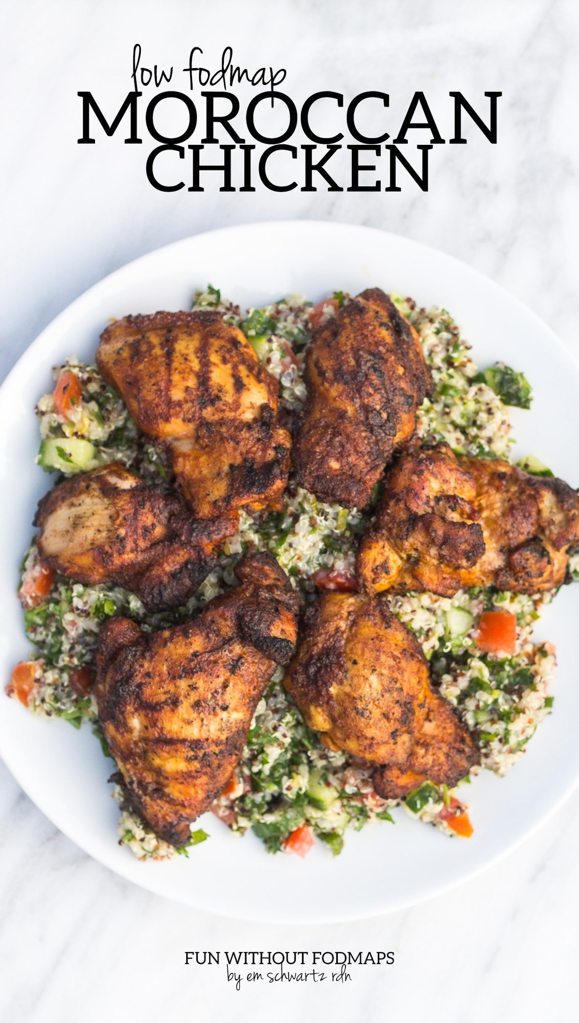 A plate of marinated and grilled chicken sitting on top of a quinoa salad. In the white space above, black text reads "Low FODMAP Moroccan Chicken."