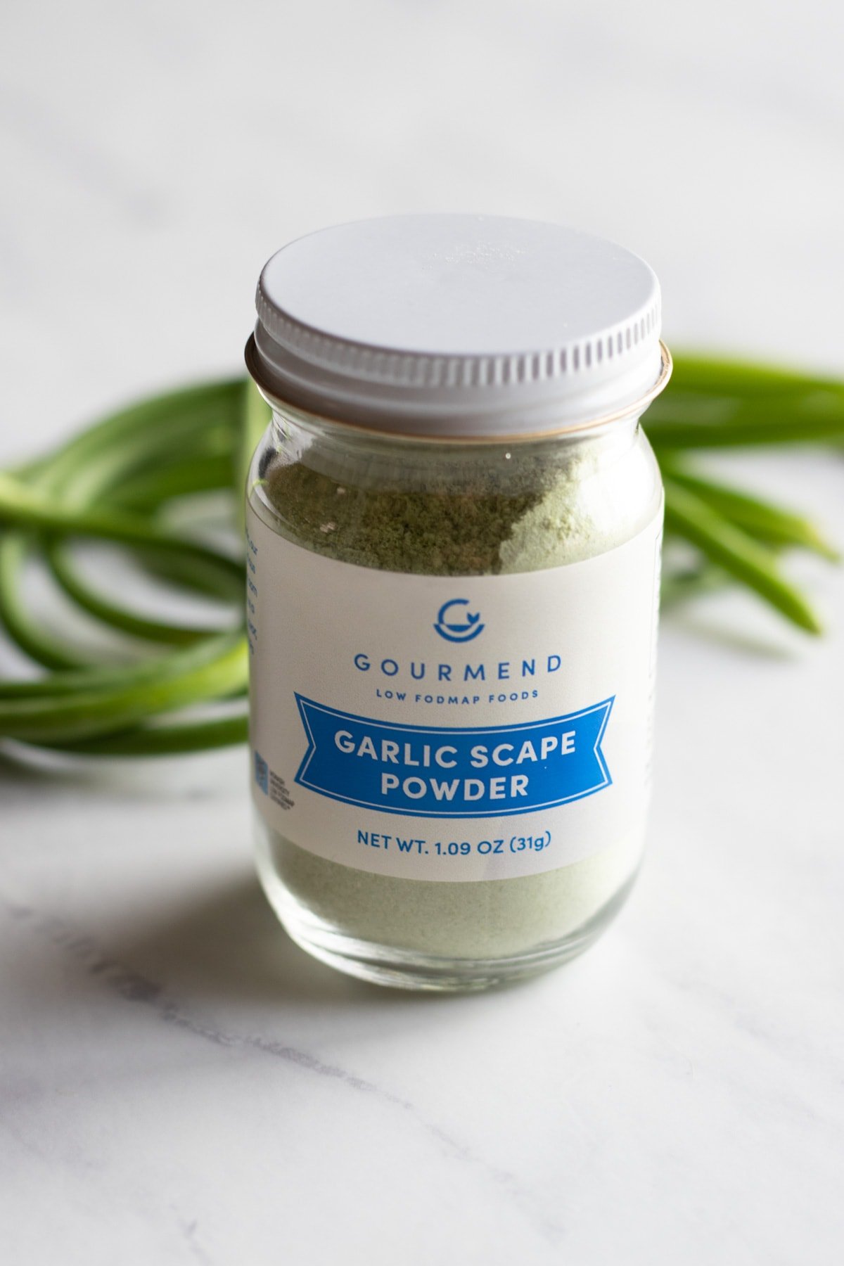 A jar of garlic scape powder