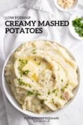 A bowl of mashed potatoes topped with snipped chives, butter, and black pepper. In the white space above, black text reads "Low FODMAP Creamy Mashed Potatoes."