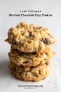A stack of three cookies. In the white space above, black text reads "Low FODMAP Oatmeal Chocolate Chip Cookies".