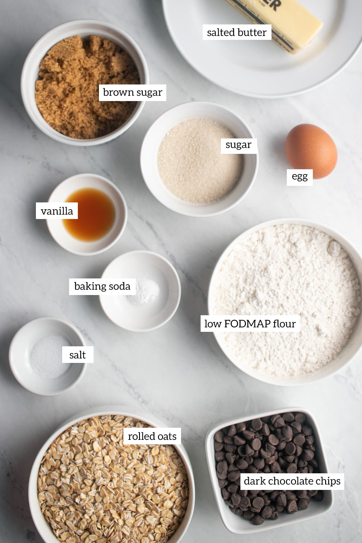 Ingredients needed for low FODMAP oatmeal cookies measured out into individual containers.