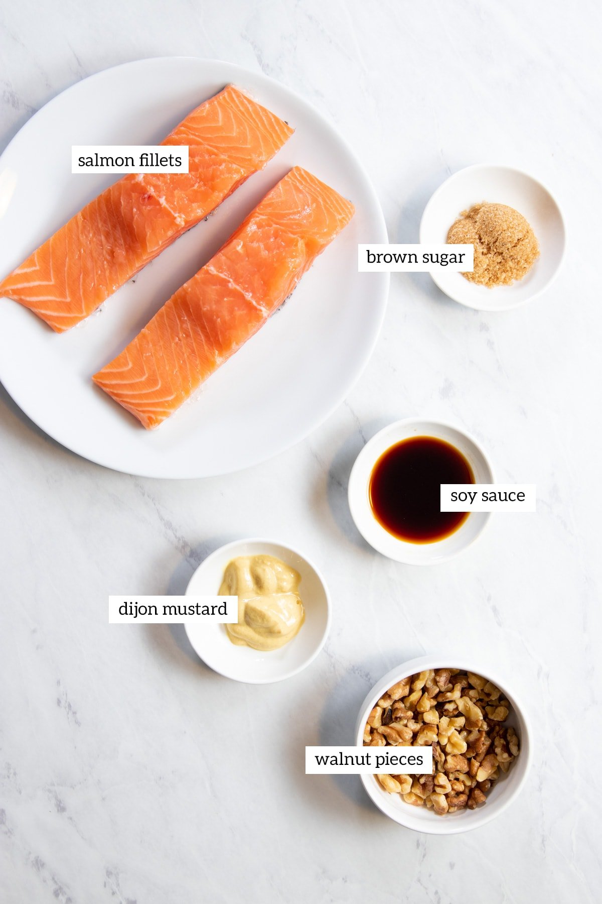 Ingredients needed for Low FODMAP Walnut-Crusted Salmon prepared and measured out into individual containers.