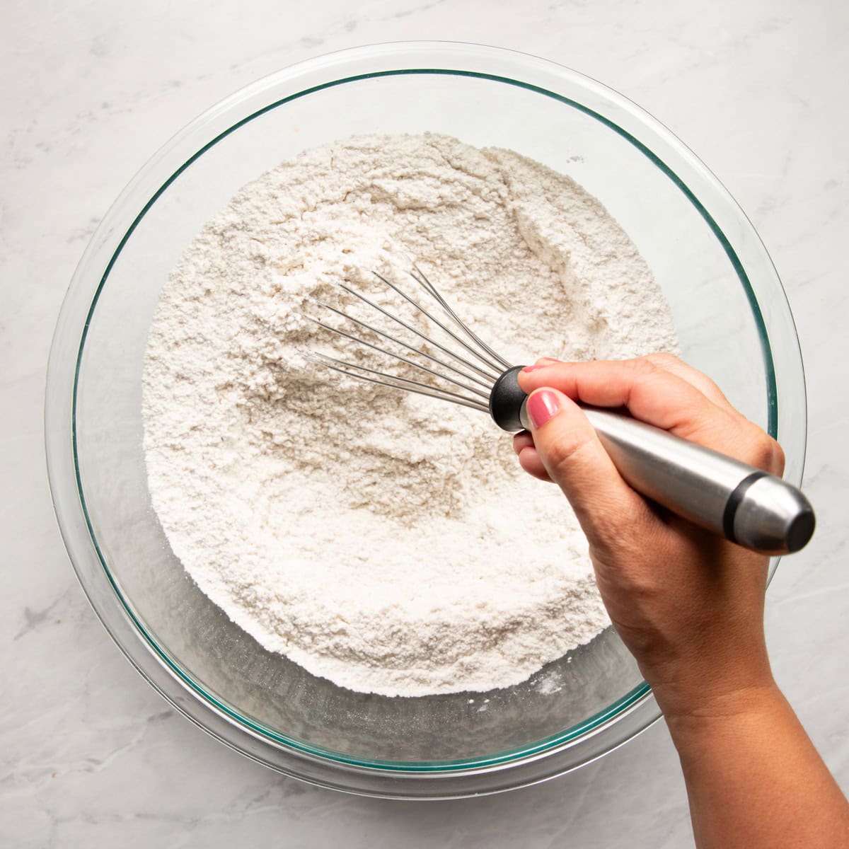 Whisking the dry ingredients needed for low FODMAP blueberry scones