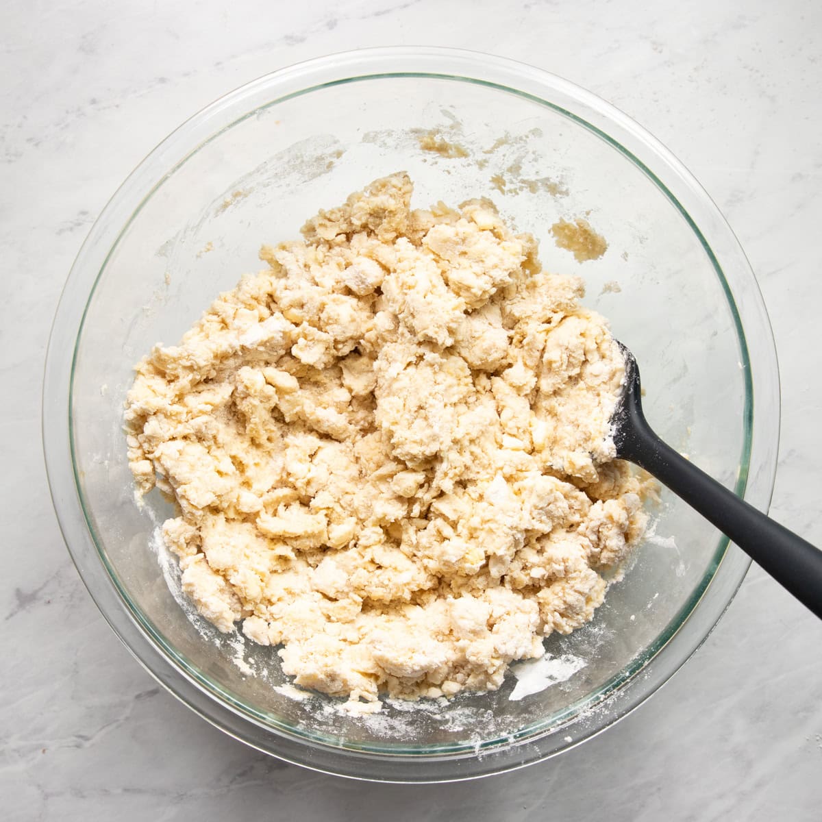 Wet ingredients have been added to dry ingredients and just mixed to form the low FODMAP blueberry scone dough.