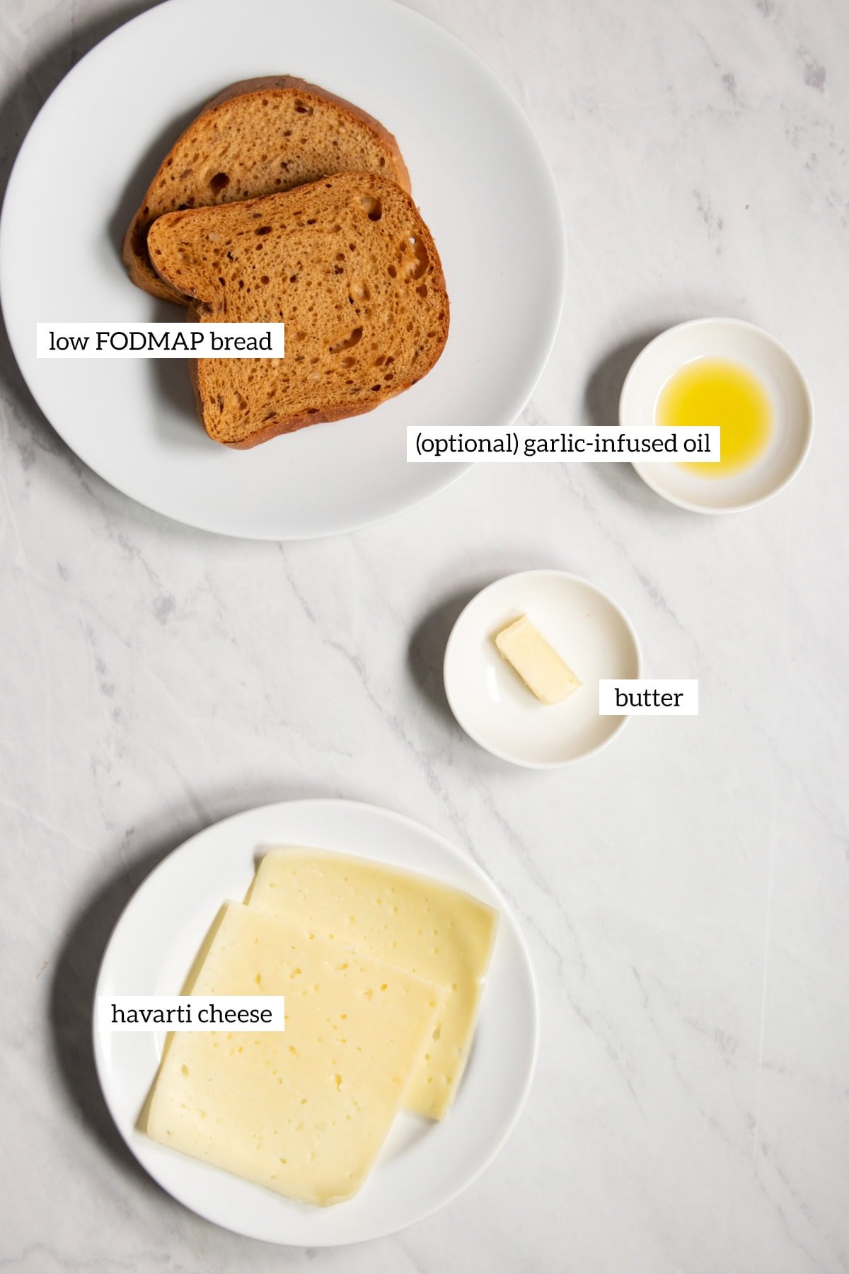 Ingredients needed for waffle-maker Low FODMAP Grilled Cheese prepared and placed into individual dishes.