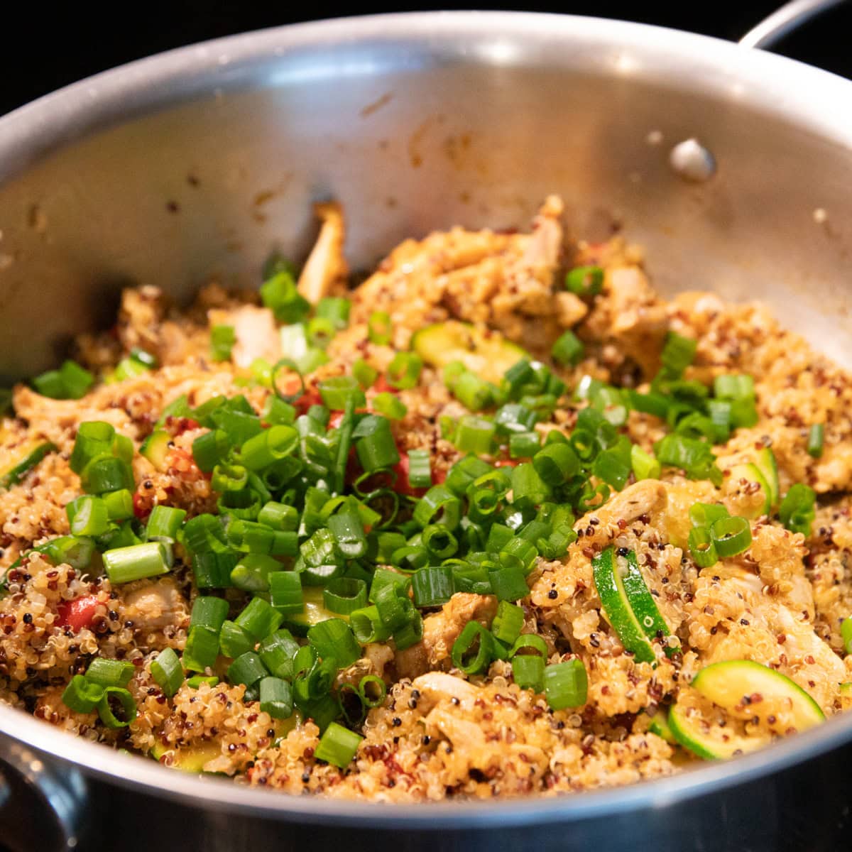 Sliced green onion tops and lemon juice are added to finish the skillet recipe.